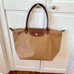 Longchamp Le Pliage Large Tote
Brand new, never worn.